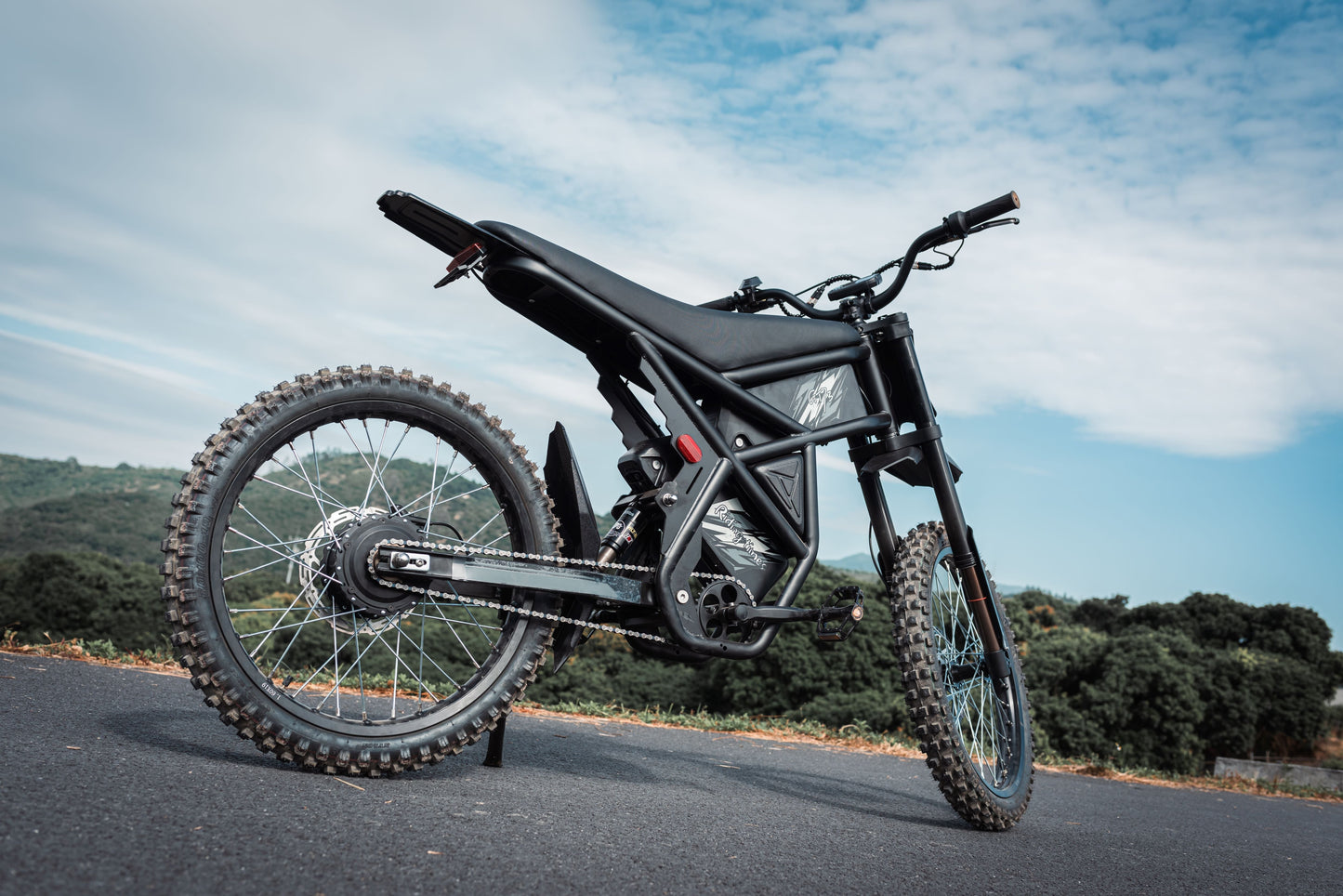 Electric dirt bike on road, related to shipping fee for warranty parts.