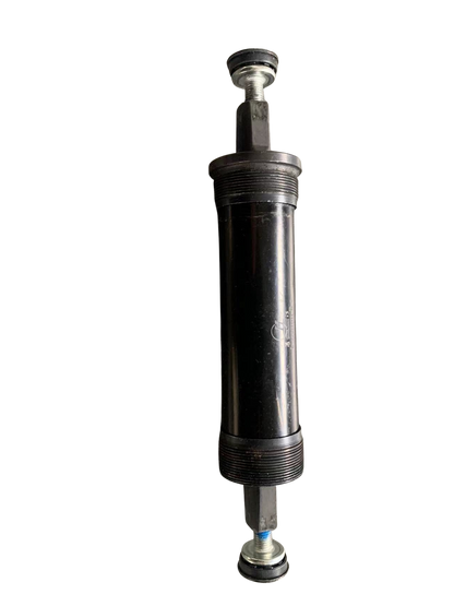 Black bicycle bottom bracket with sealed bearing system for smooth drivetrain rotation and efficient power transfer