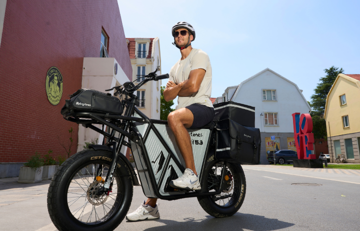 Black waterproof high-capacity bags set on GT53 electric bike with faux leather material.