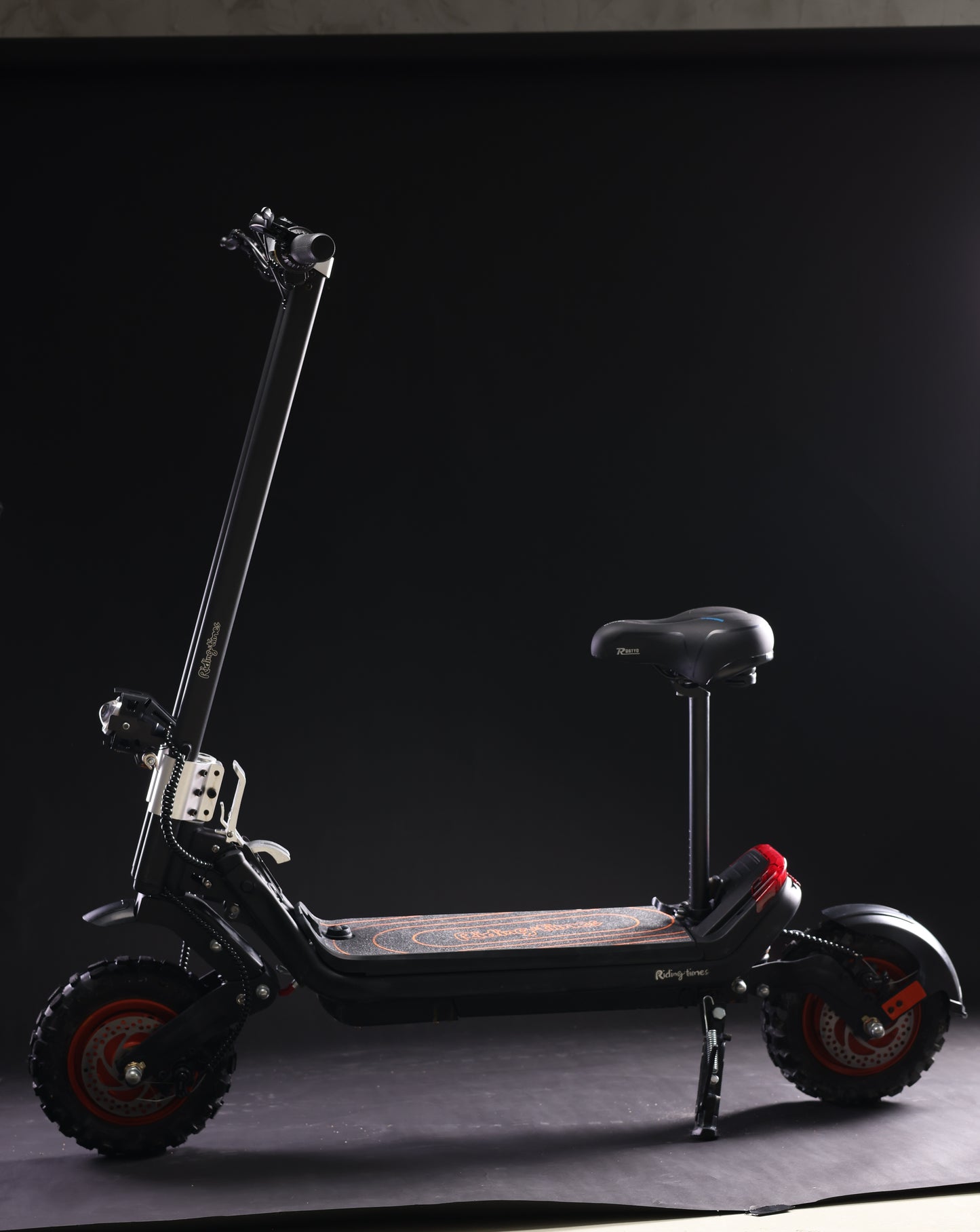 G63 Dual Motor Electric Scooter with seat, black frame, off-road tires.