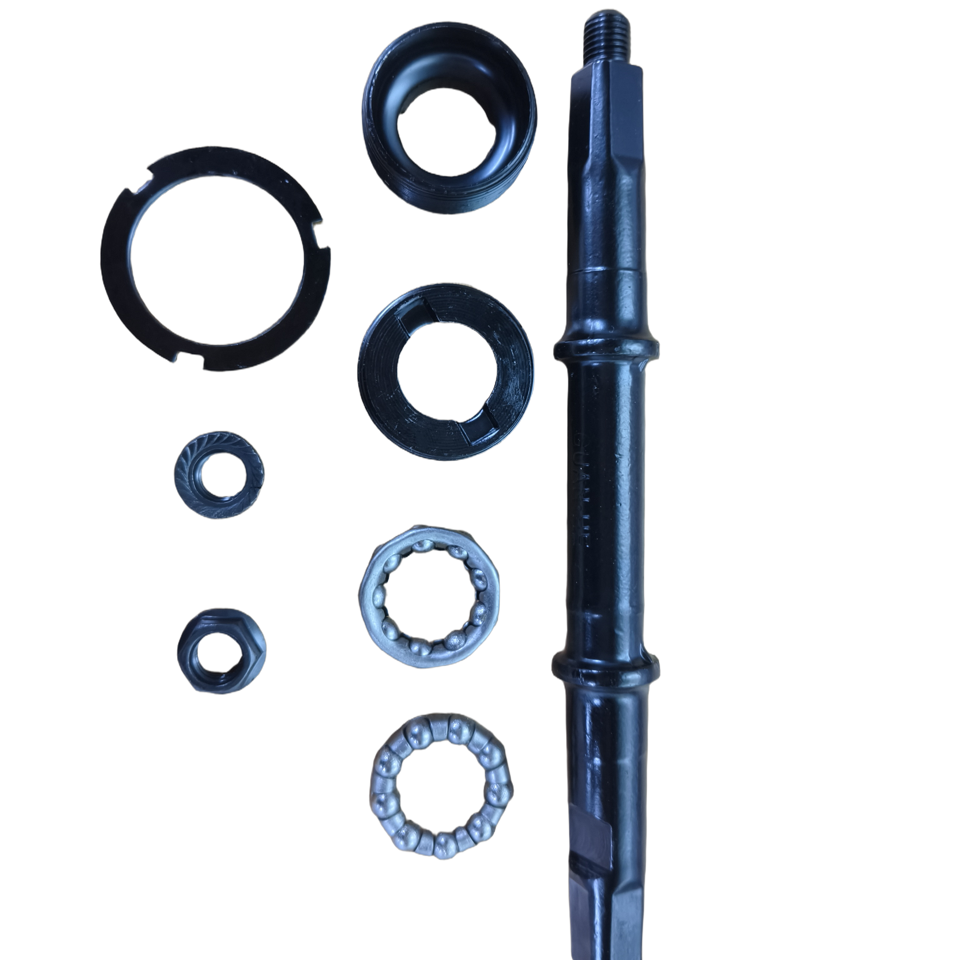 GT73 complete bottom bracket assembly parts including spindle, bearings, and seals isolated on white background