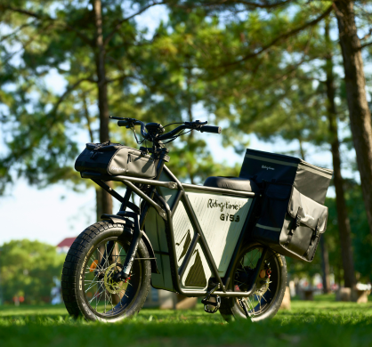 Waterproof high-capacity bags set on GT53 electric bike in park setting.